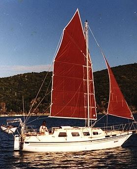  fitted with a junk style mainsail. This boat was built in Australia